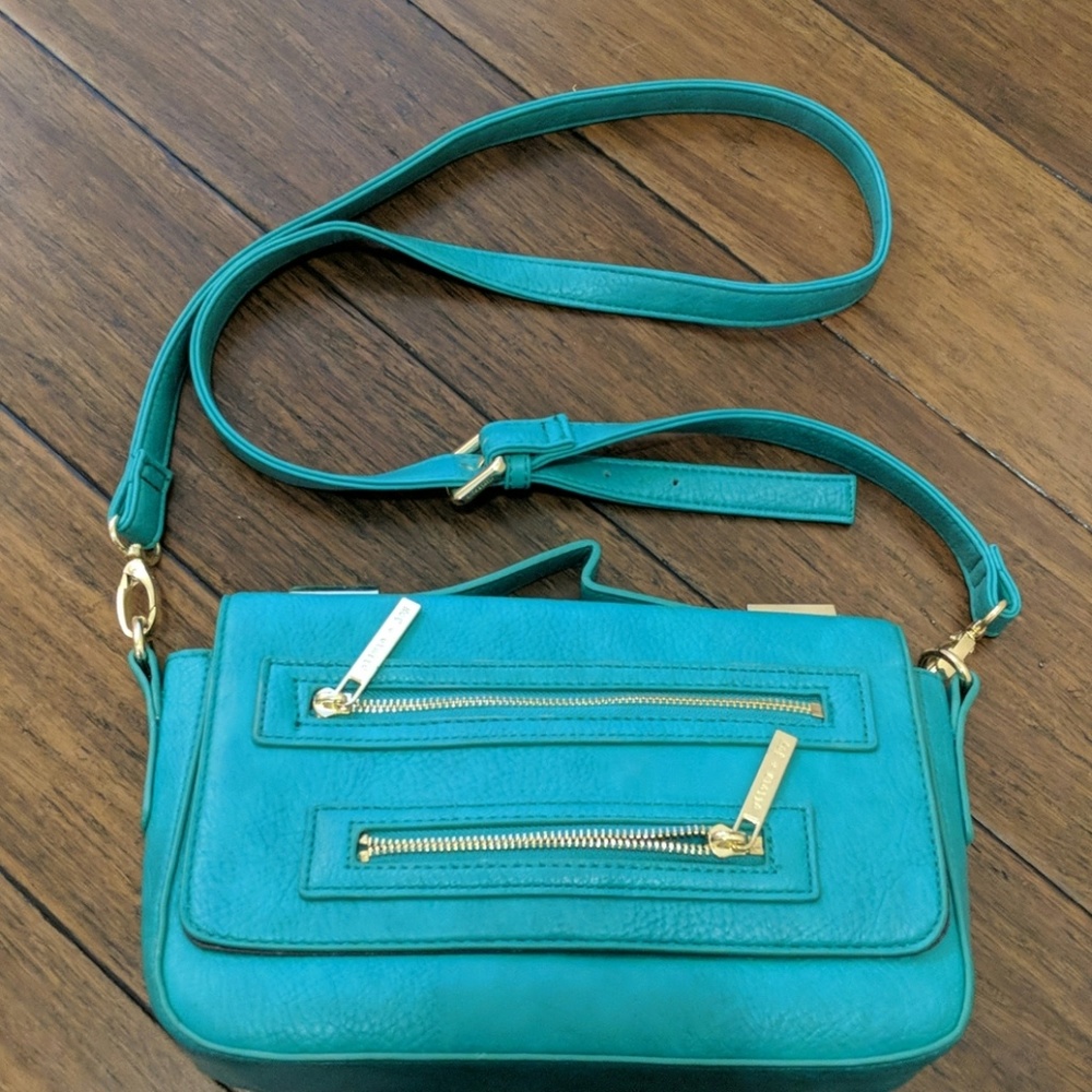 Emerald green purse with removable strap